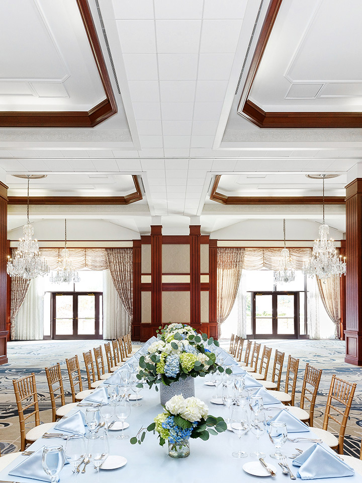White room long set table with flowers