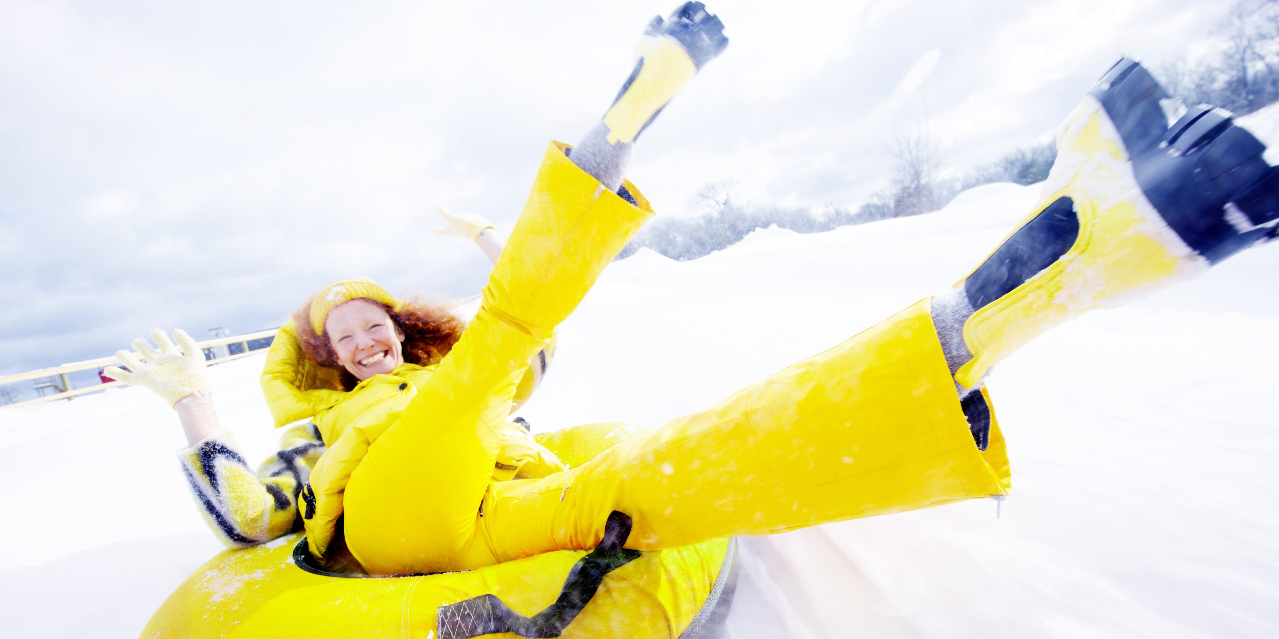 person snow tubing