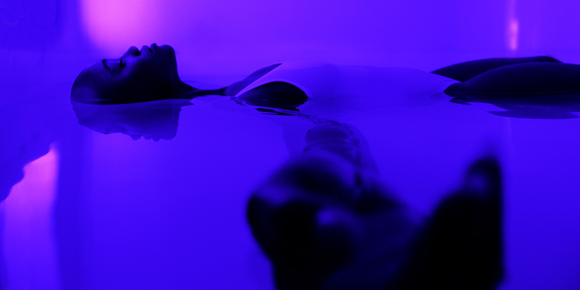 women in a float tank