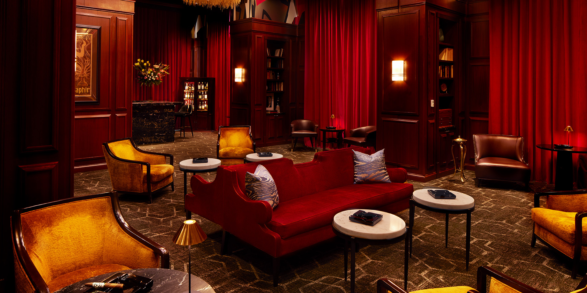 A cigar lounge with red decor