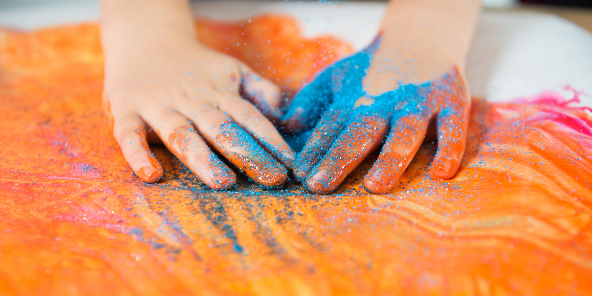 child's hands painting