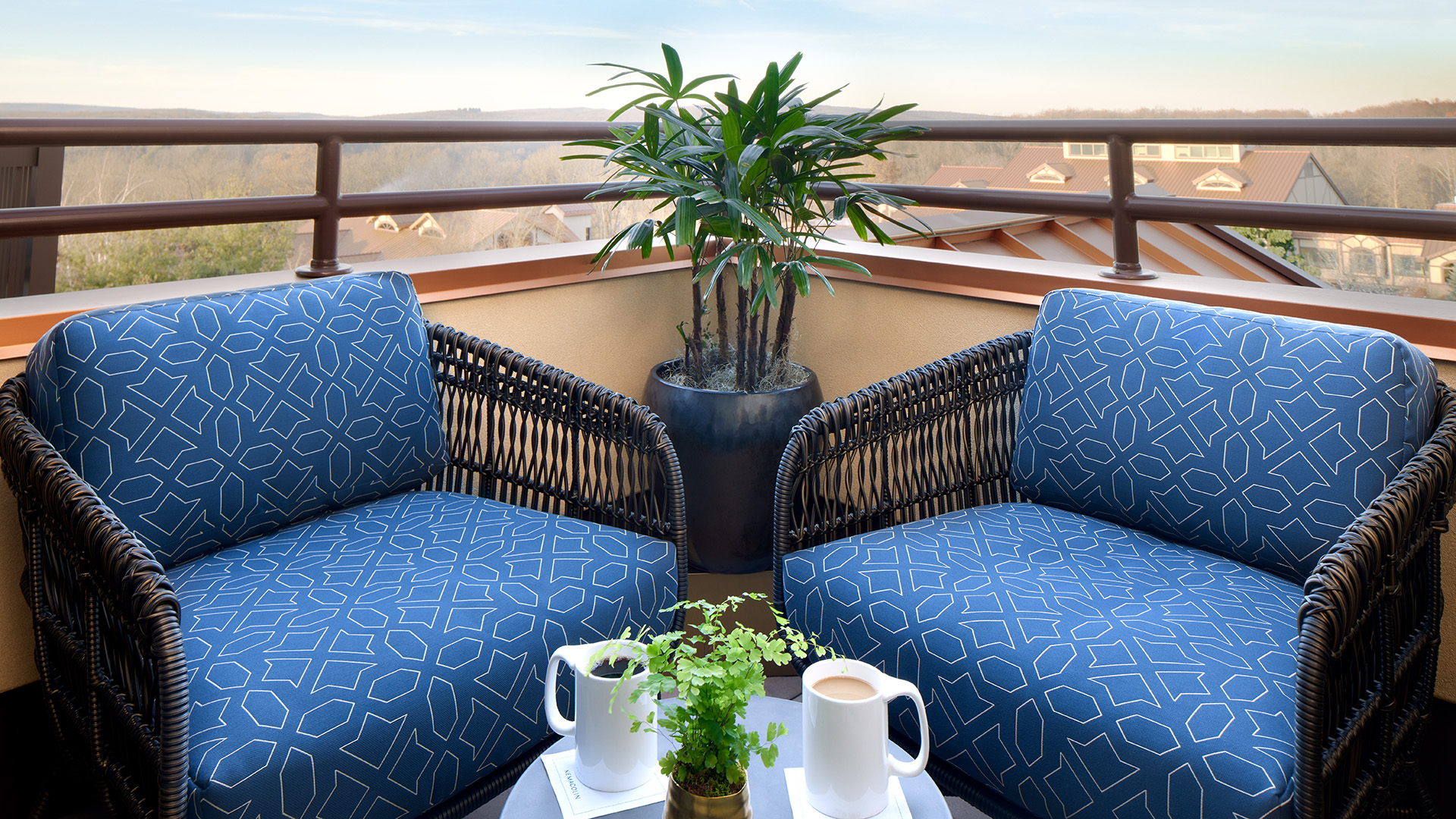 two chairs on a balcony