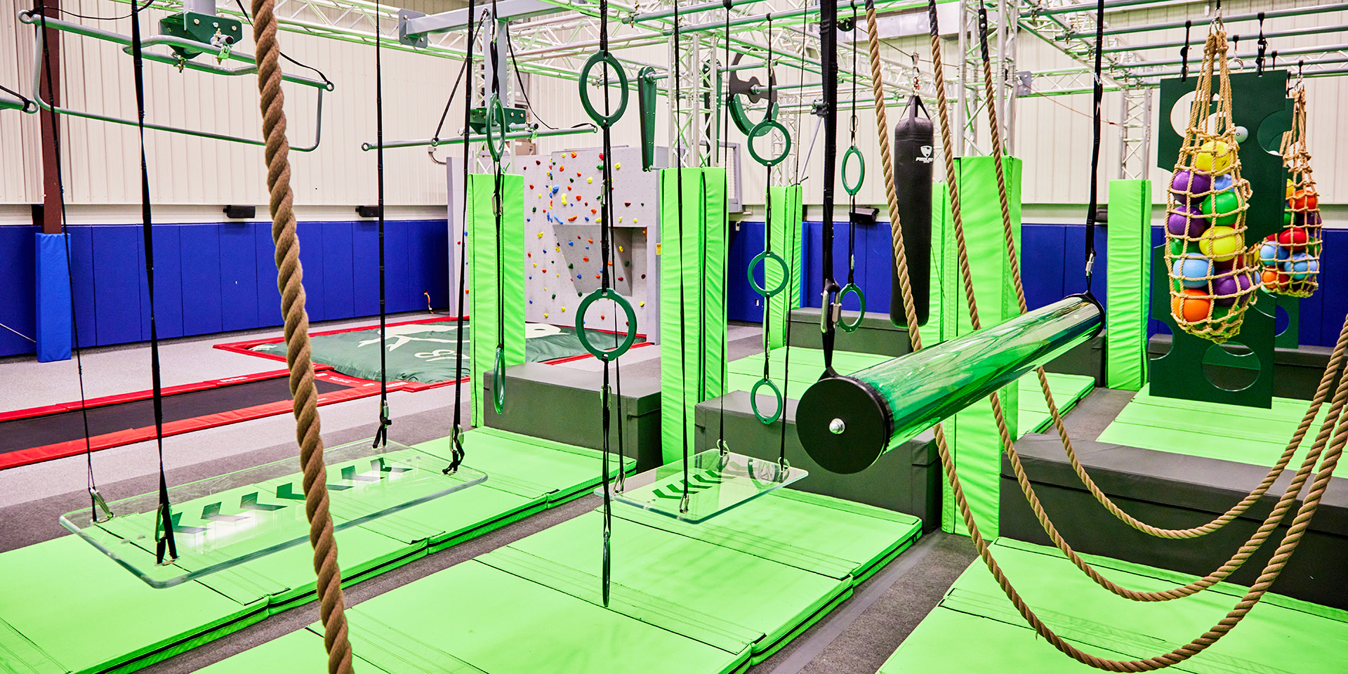 gym with ninja course and climbing wall