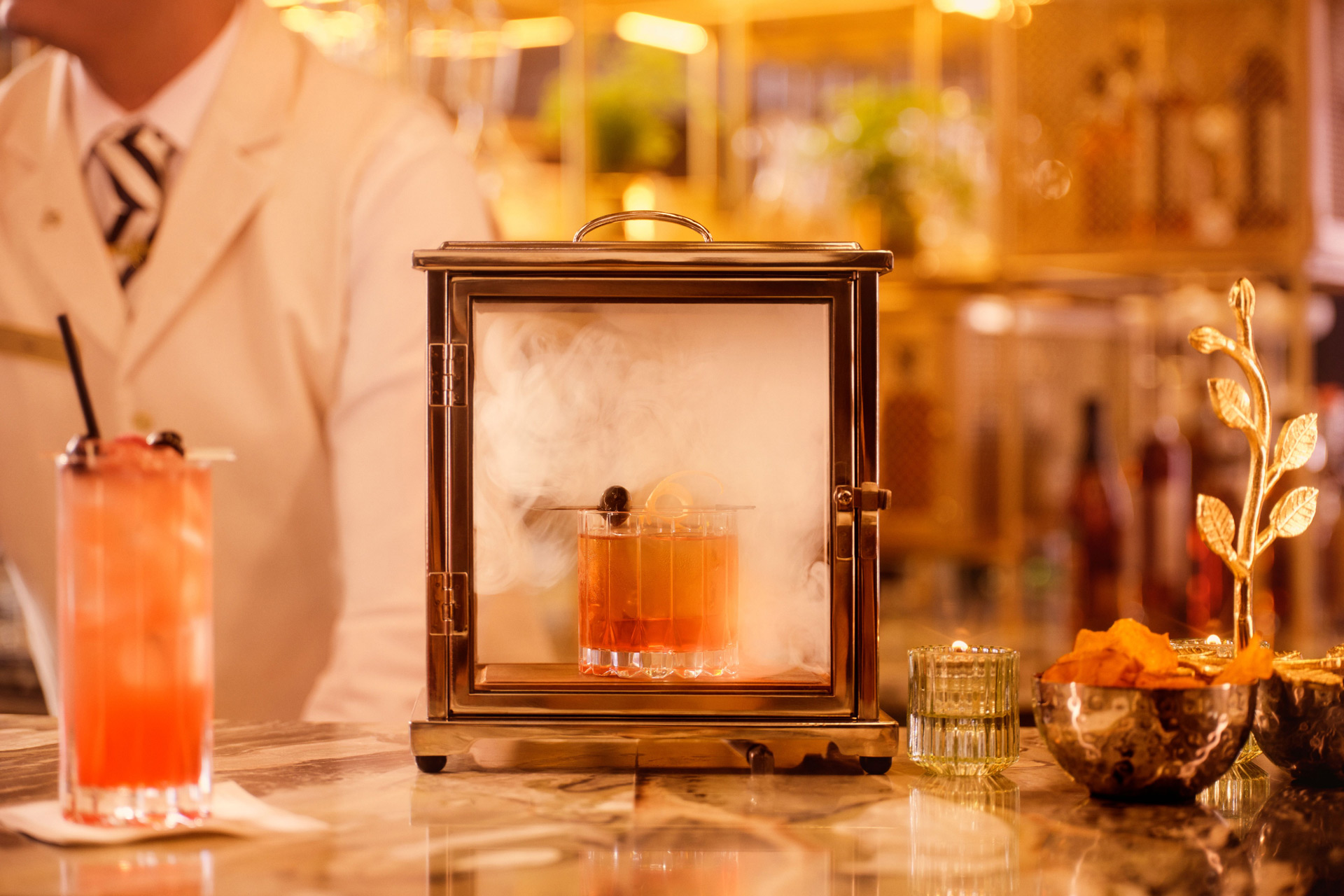 Click here to open the gallery overlay for the image: decorative image of cocktails being served