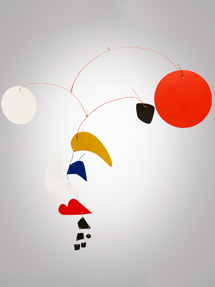 Calder mobile with bright colors of red, white, black, blue, and yellow on display at Nemacolin resort