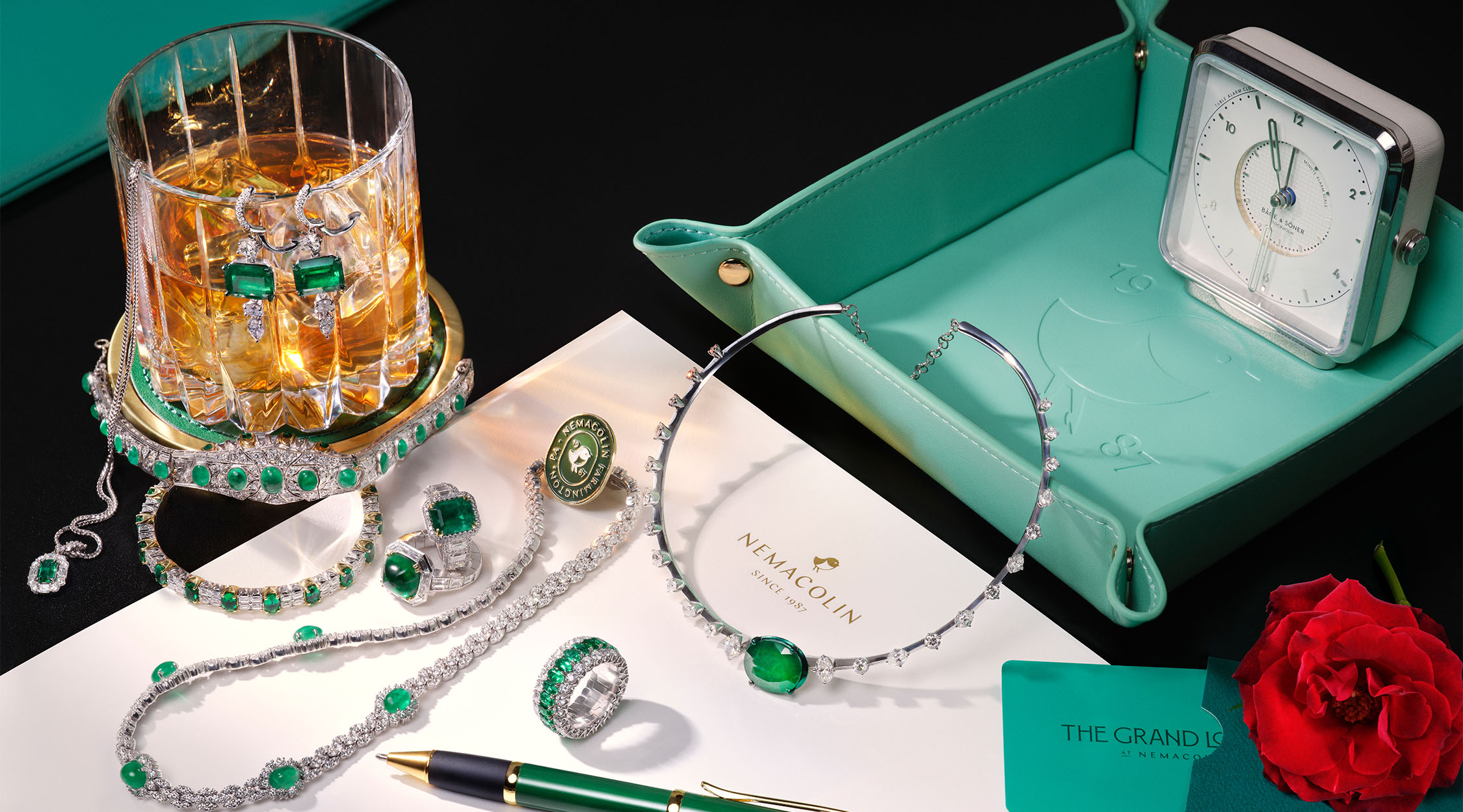 jewelry on a desk with stationary