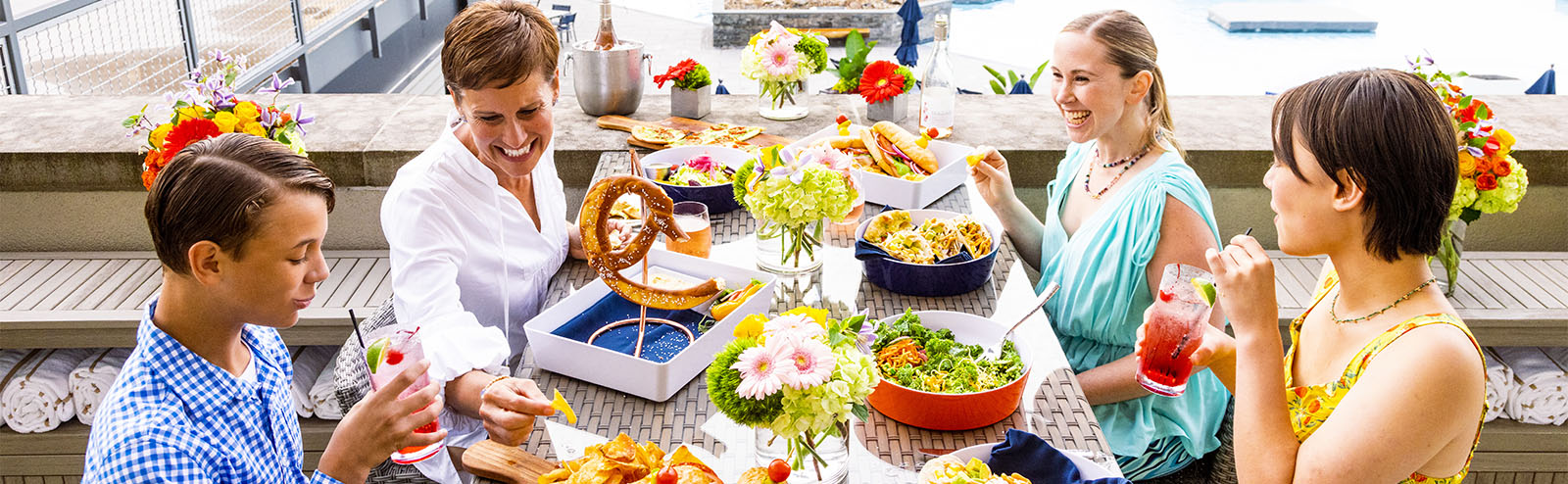 family eating at an outdoor restaurant